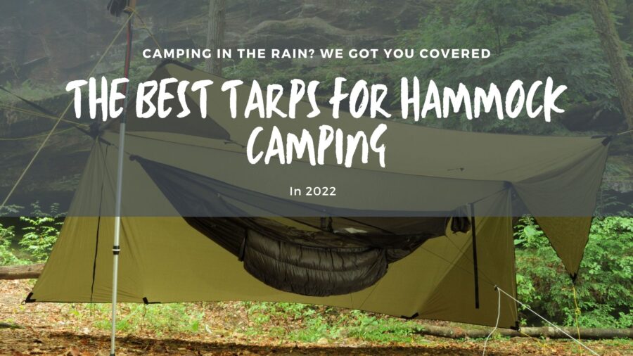 one of our camping hammock tarps covering a camping hammock from the weather